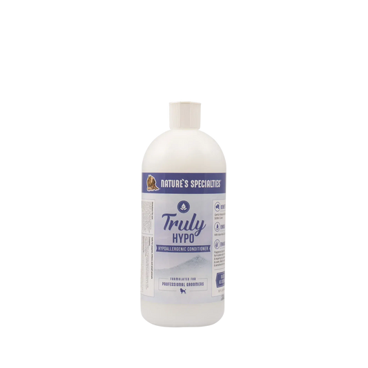 Hypoallergenic conditioner bottle, white with purple Truly Hypo label and cap