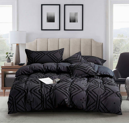 Black jacquard duvet cover set with geometric quilted pattern and matching pillowcases