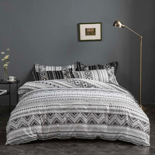 King quilt and duvet cover set in black-and-white stripe and geometric prints