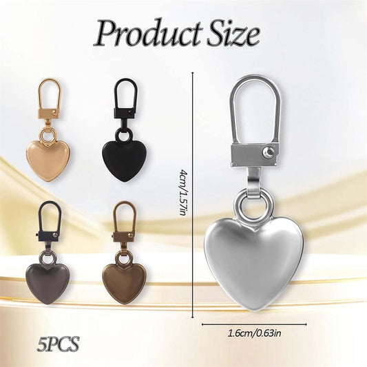 Heart-shaped metal zipper pull charms, shown by size for five-piece set