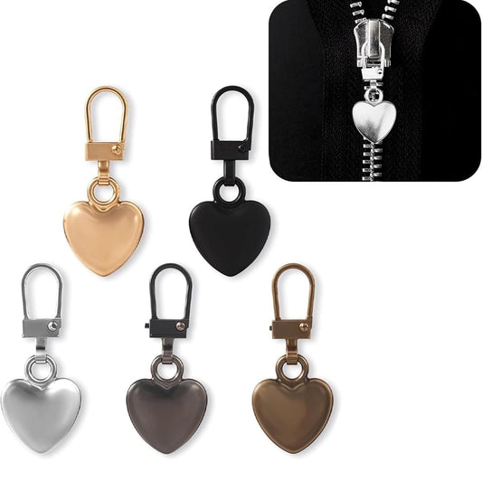 Heart-shaped metal zipper pull tabs on split rings, in light gold and dark colors