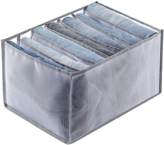 Gray foldable drawer organizer with 7 fabric dividers and handles, holds folded jeans.