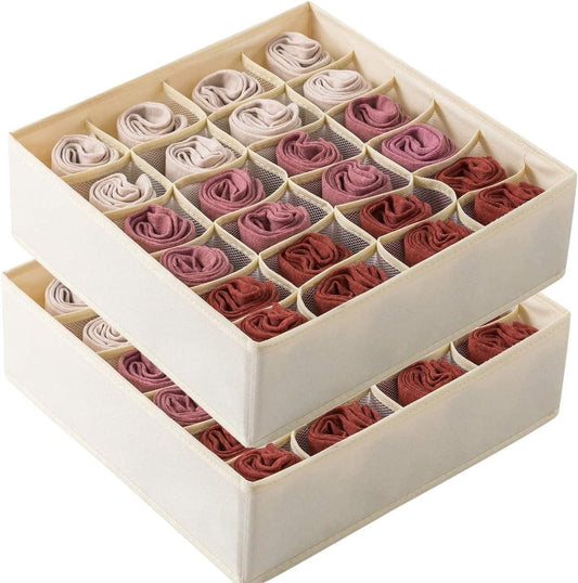 Cream fabric drawer organizer set with two sections and cell dividers, filled with rolled socks