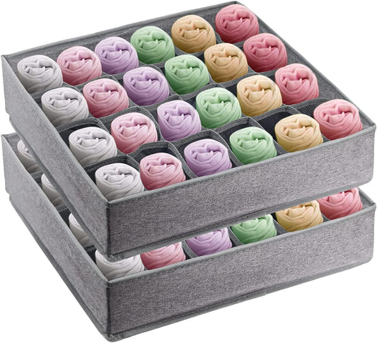 Stacked gray foldable organizers with handle, filled with rolled socks or soft items