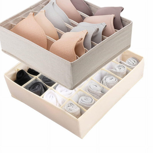 Beige fabric drawer organizer with handle, grid cells for folded clothes