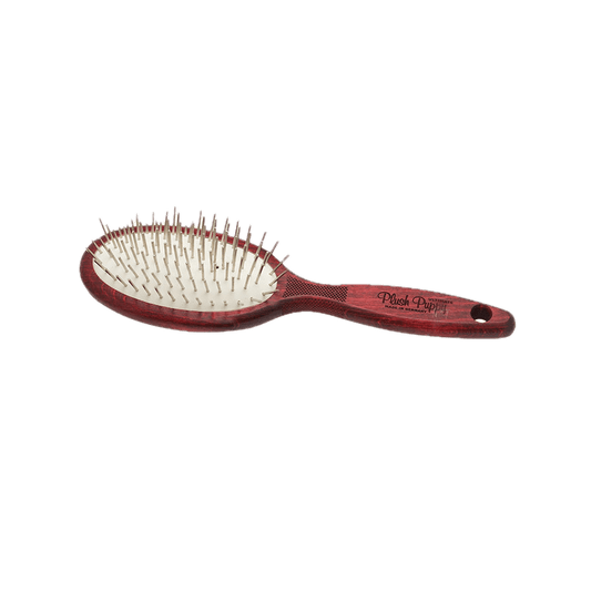 Thick pin hairbrush with white pins and maroon ergonomic handle, oval brush head.