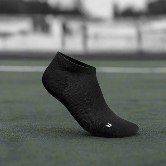 Black low-cut performance sock with small logo