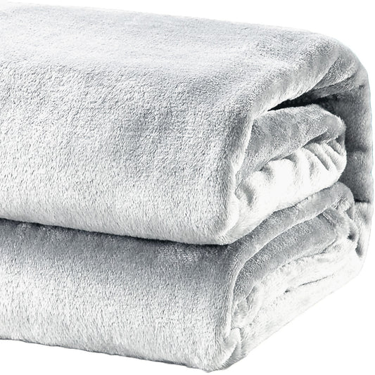 Heavyweight mink-style acrylic blanket in dove gray, folded, plush textured pile