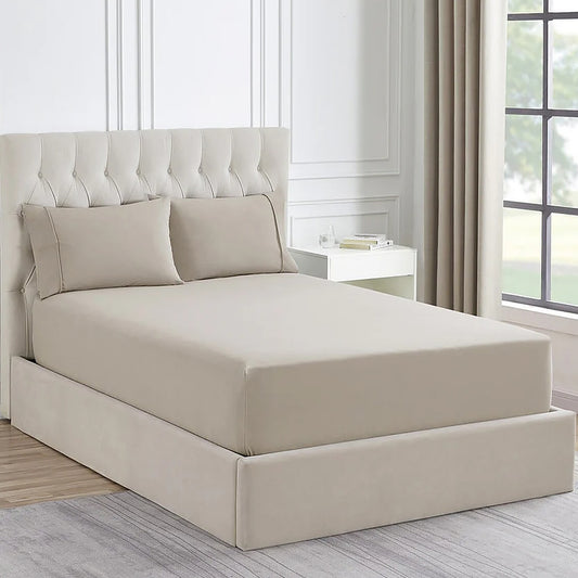 Sand king bed set with matching fitted sheet, flat sheet, and two pillows on bed