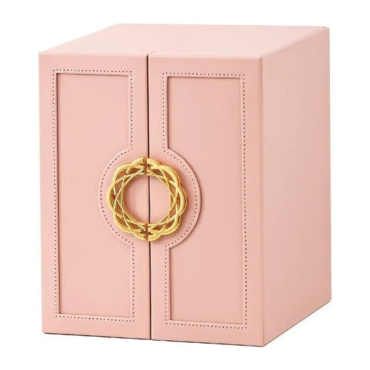 Pink faux leather jewelry storage box with gold ring emblem on side door