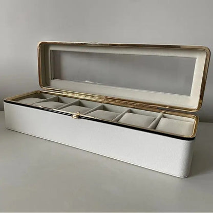 Luxury transparent-lid watch box with 6 fabric-lined compartments, portable and shockproof design, suitable for both men and women. Ideal for home, travel, or gifting—a refined storage solution for fine watches and jewelry. (White)