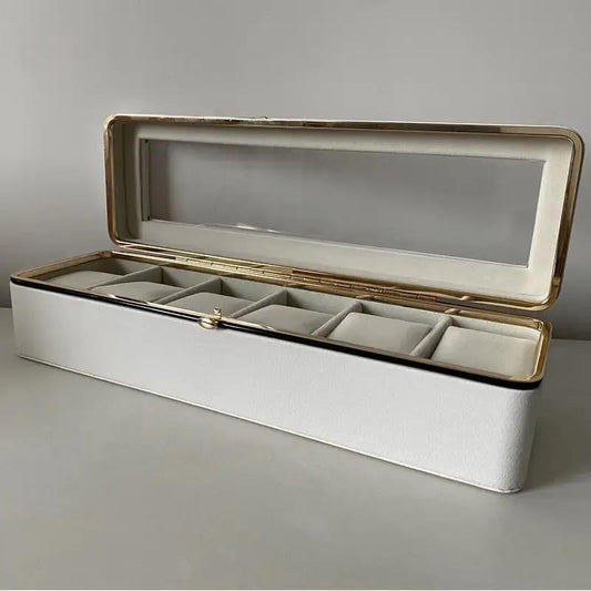 White 6-compartment watch box with clear lid and gray padded dividers