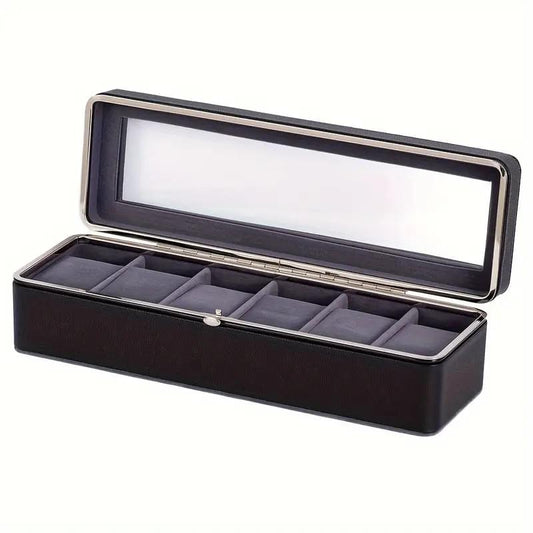 Dark watch box open with clear lid and padded compartments with latch