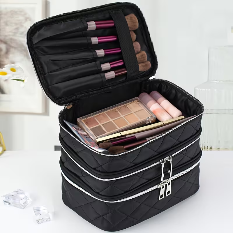 Fashionable and light luxury large-capacity black embroidered diamond-shaped cosmetic bag with three  for multi-level storage, portable and hand-held, suitable for home and travel use.