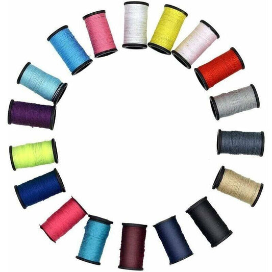 Assorted sewing kit thread spools in multiple colors