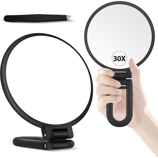 Handheld double-sided magnifying mirror with black handle and round 30X lens
