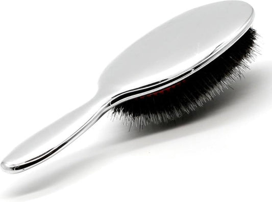 Boar bristle hairbrush with dark bristles and silver handle