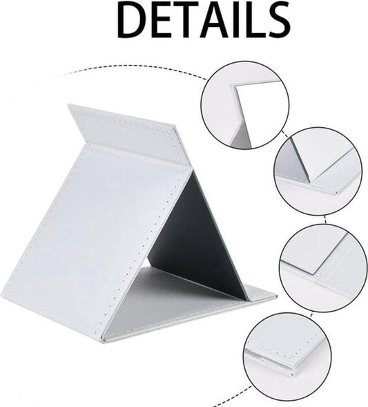 Folding tabletop mirror with PU leather cover, stitched edges and hinged stand detail