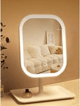 LED makeup mirror with rounded rectangular light frame on a tabletop stand.