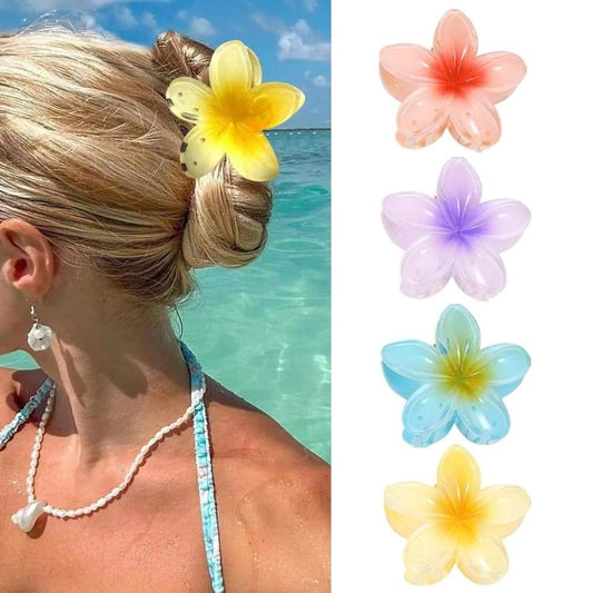 Yellow flower hair clip with anti-slip grip, on brown hair