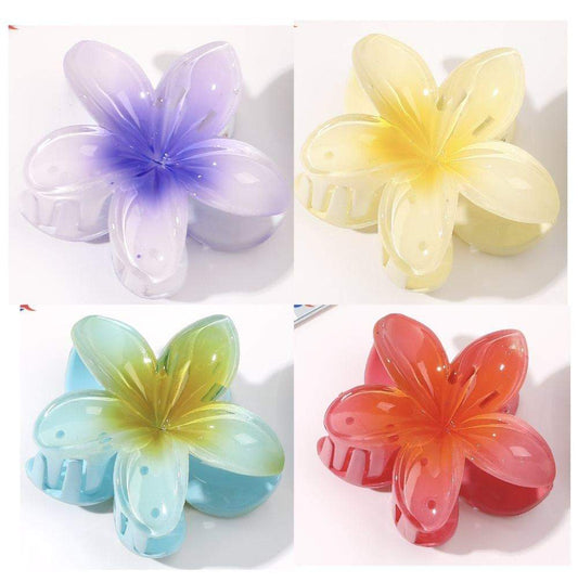 Set of four pastel flower hair clips: lavender, pale yellow, light blue, coral