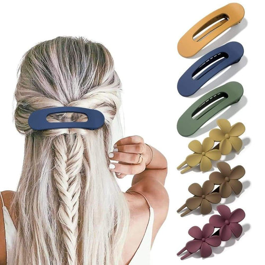 Large claw hair clips in blue, tan, and green with metal spring grip