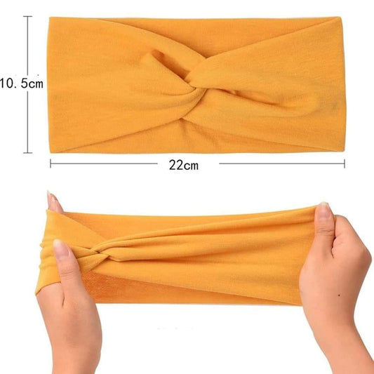 Mustard elastic headband with centered bow-twist, 22cm length