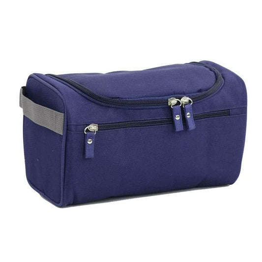 Dark blue zip-top toiletry bag with handle strap and front zipper pocket.