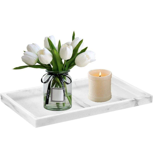 Light gray rectangular silicone storage tray with raised edges and small items