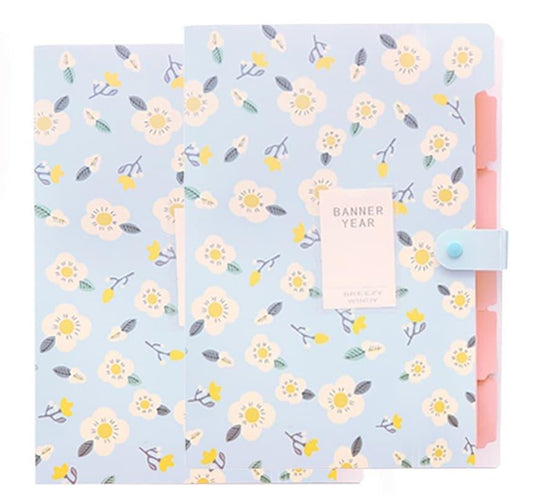 Blue document folder with white and yellow floral pattern and pink elastic side strap