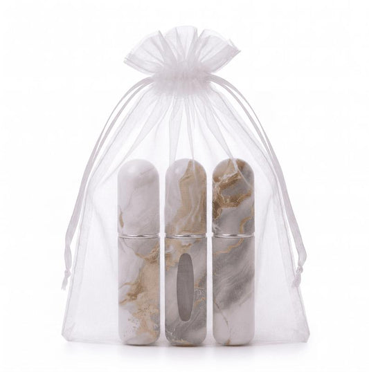 3 travel perfume atomizer bottles in sheer drawstring pouch, champagne marble finish