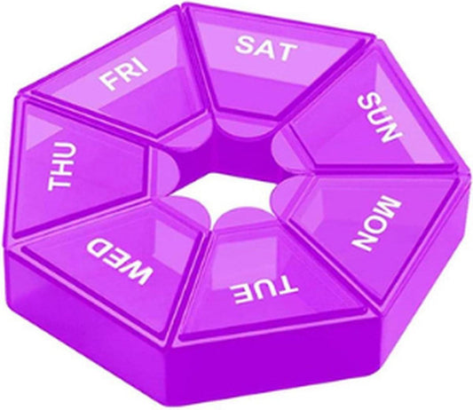 Purple 7-day pill organizer box with seven labeled day compartments