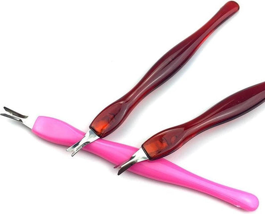 Cuticle knife set with pink guards and red translucent handles, metal forks and blades