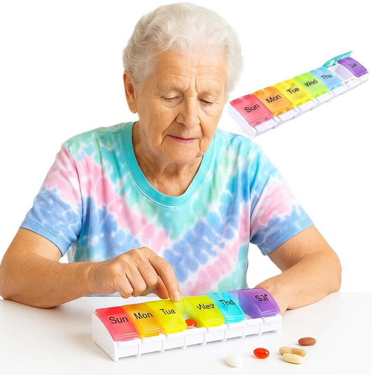 7-day multicolor pill box with push-button day compartments, white base