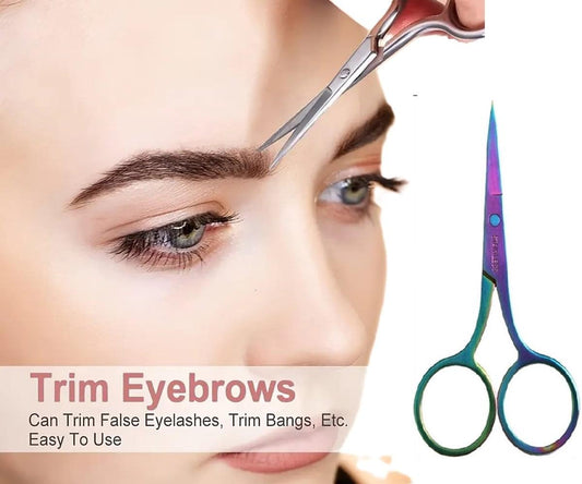 Eyebrow and cuticle scissors with purple blades and green finger loops