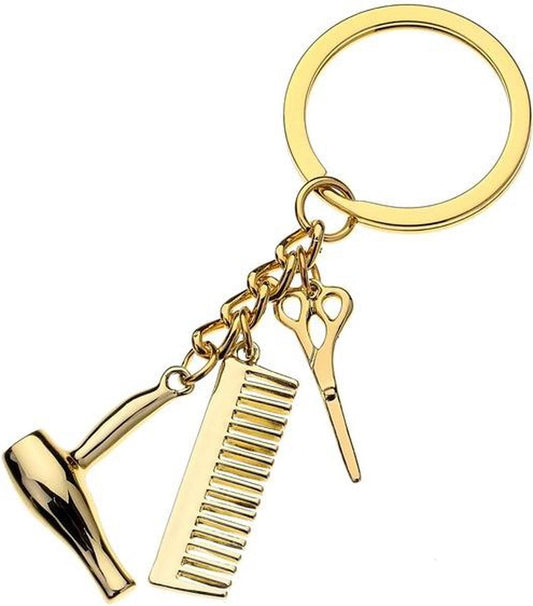 Gold hairdresser keychain with ring and comb, scissors, and hairdryer charms