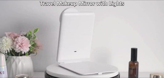 White travel makeup mirror with illuminated LED edge and round touch button