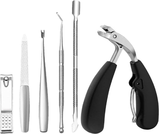 Nail clipper set with two clippers, nail file, and metal tools laid out