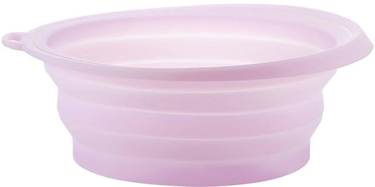Pink foldable silicone facial cooling basin with wide rim.