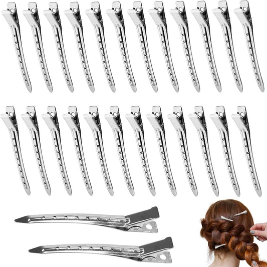 Silver duckbill hairpins with holes, metal styling clips arranged in a set