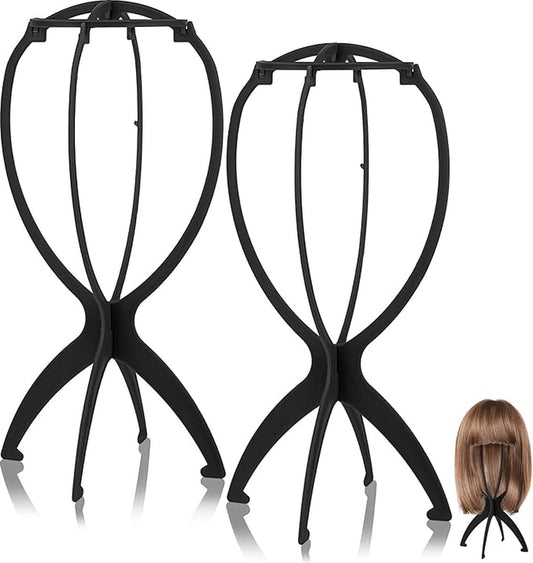 Black plastic wig stand with three-part base, upright mannequin head holder