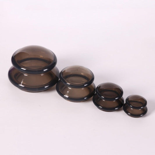 Black silicone cupping cups set with four suction cups, stacked sizes