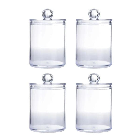 Set of clear glass apothecary jars with removable domed lids, cylindrical shape
