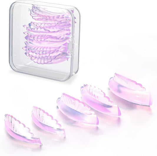 Transparent lash lift silicone pads in clear case, stacked pink tinted shields
