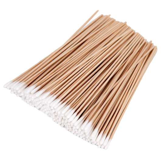 Cotton swab applicators with white cotton tips on light wood handles, bulk pack.