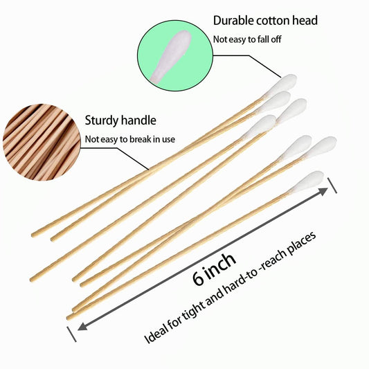 Cotton swab applicators with white cotton tips and light wood handles, 6-inch style.
