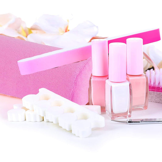 Pink nail art wrist cushion with nail bottles and nail tools