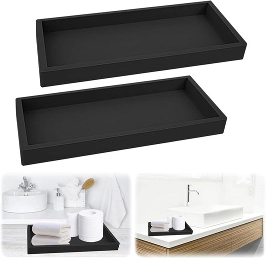 Set of 2 black bathroom storage trays, rectangular with raised sides.