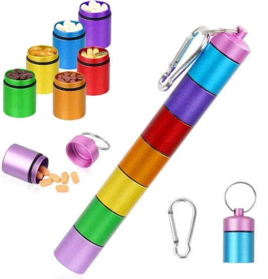 Rainbow pill organizer with 7 compartments, clip ring, and open lid