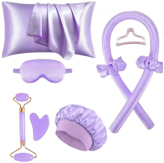 Purple satin curling set accessories: head wrap, sleep mask, curling tools, and scrunches.